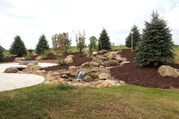 Cascading Waterfall Next to Patio